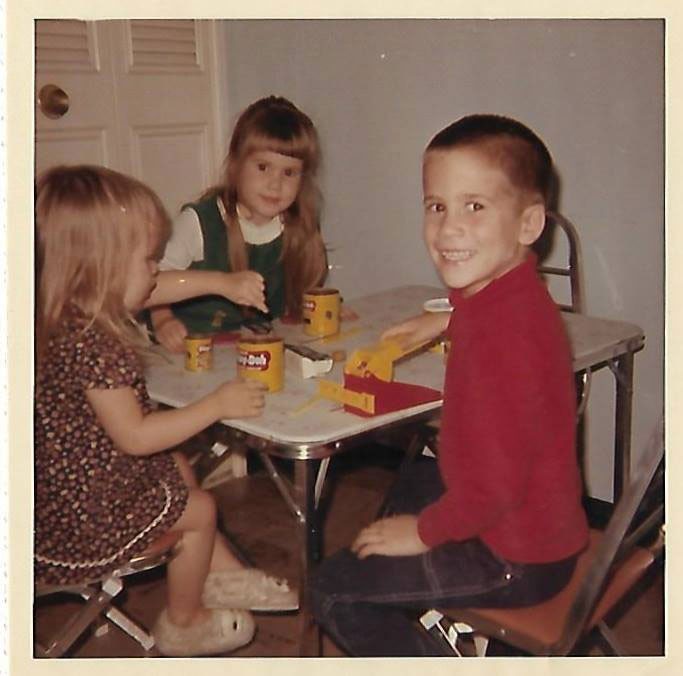 Christa Schoenbrodt as a kid playing with playdoh.