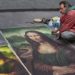 Italian artist drawing Mona Lisa in streets of Tuscany