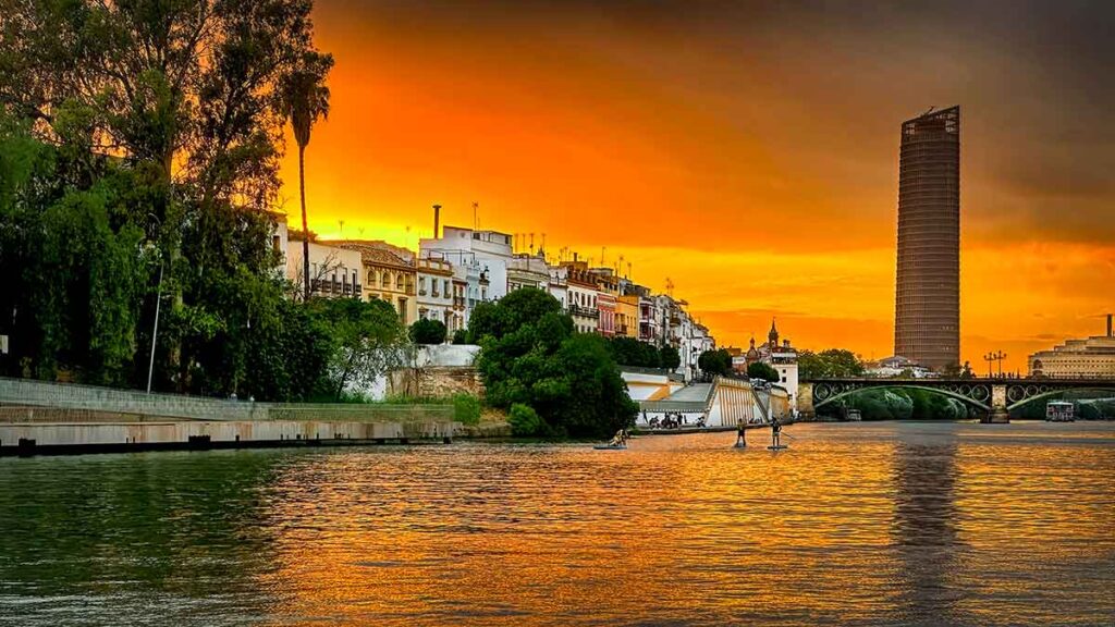 sunset triana bridge, seville spain, Guadalquivir River