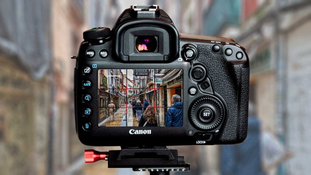 Enhance Your Photos Using the Rule of Thirds, people walking down a European street using the rule of thirds grid.